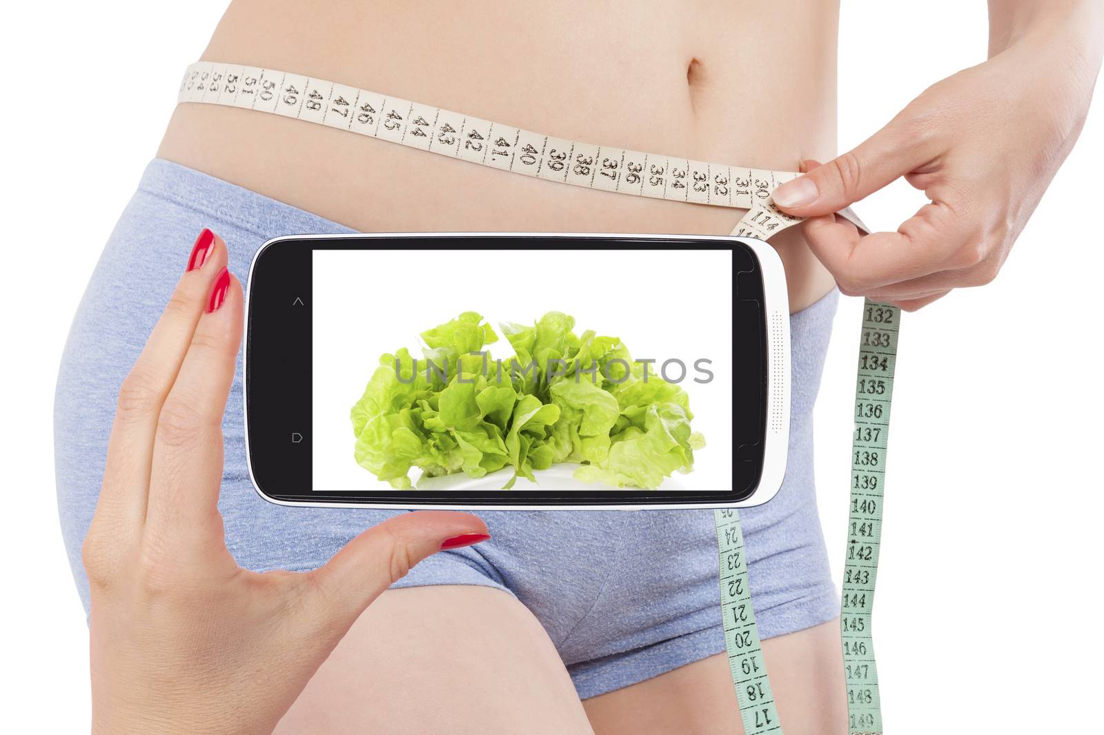 Weightloss and diet in information age. Diet, detox and fitness app on smartphone screen and attractive beautiful woman measuring her body with tape measure. Modern technology and healthy lifestyle. 