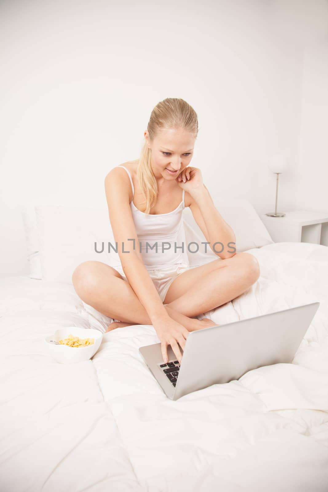 Woman looking at computer by ifilms