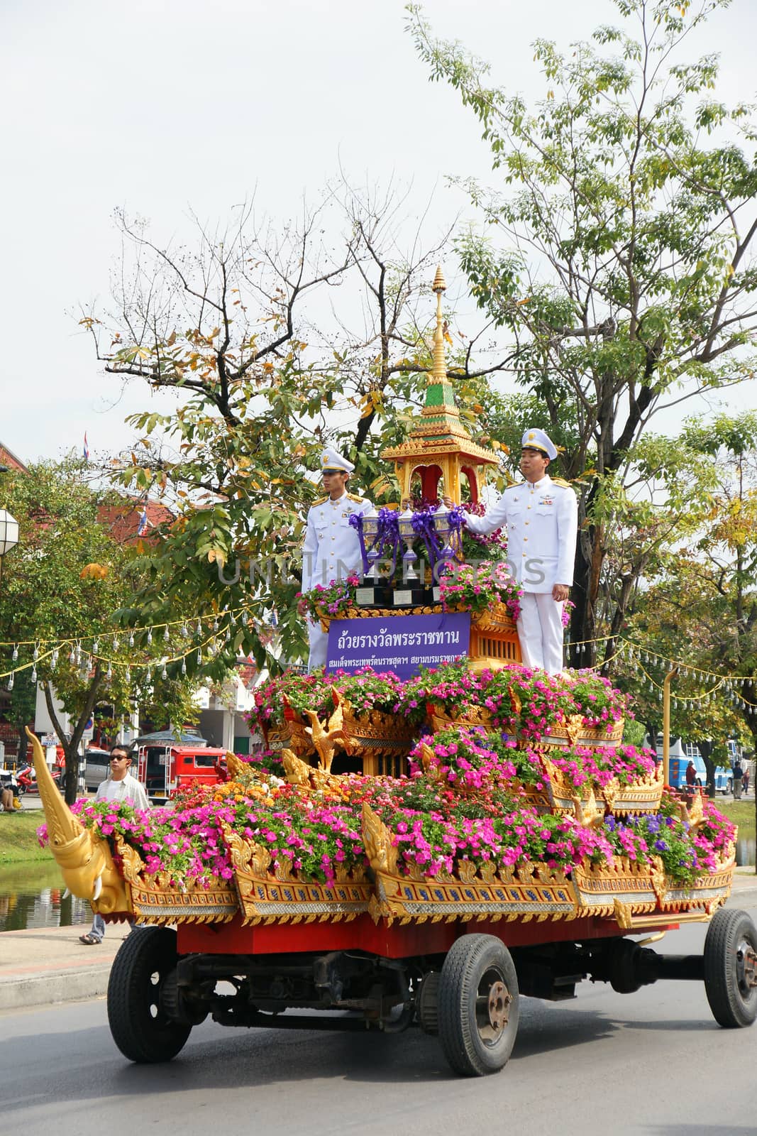 CHIANGMAI, THAILAND - FEBRUARY 2-2013 : Unidentified Thai people on the parade in ChiangMai Flower Festival 2013 at ChiangMai, Thailand.