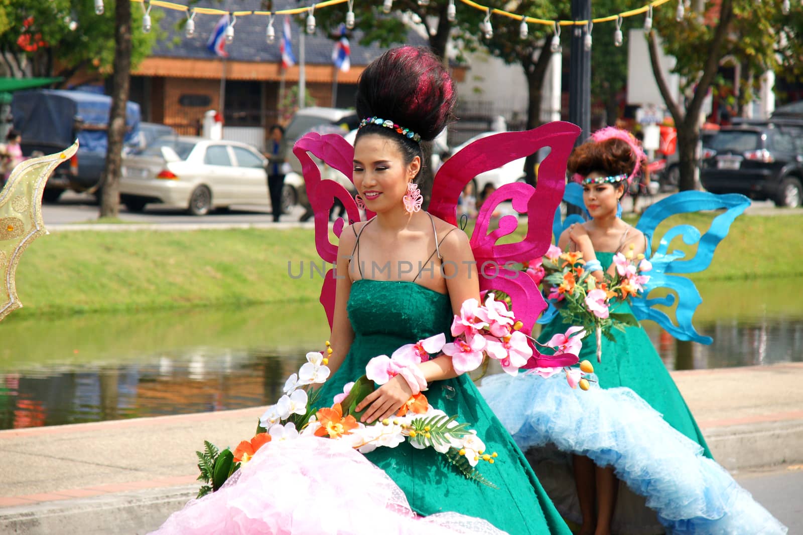 CHIANGMAI, THAILAND - FEBRUARY 2-2013 : Unidentified Thai people on the parade in ChiangMai Flower Festival 2013 at ChiangMai, Thailand.