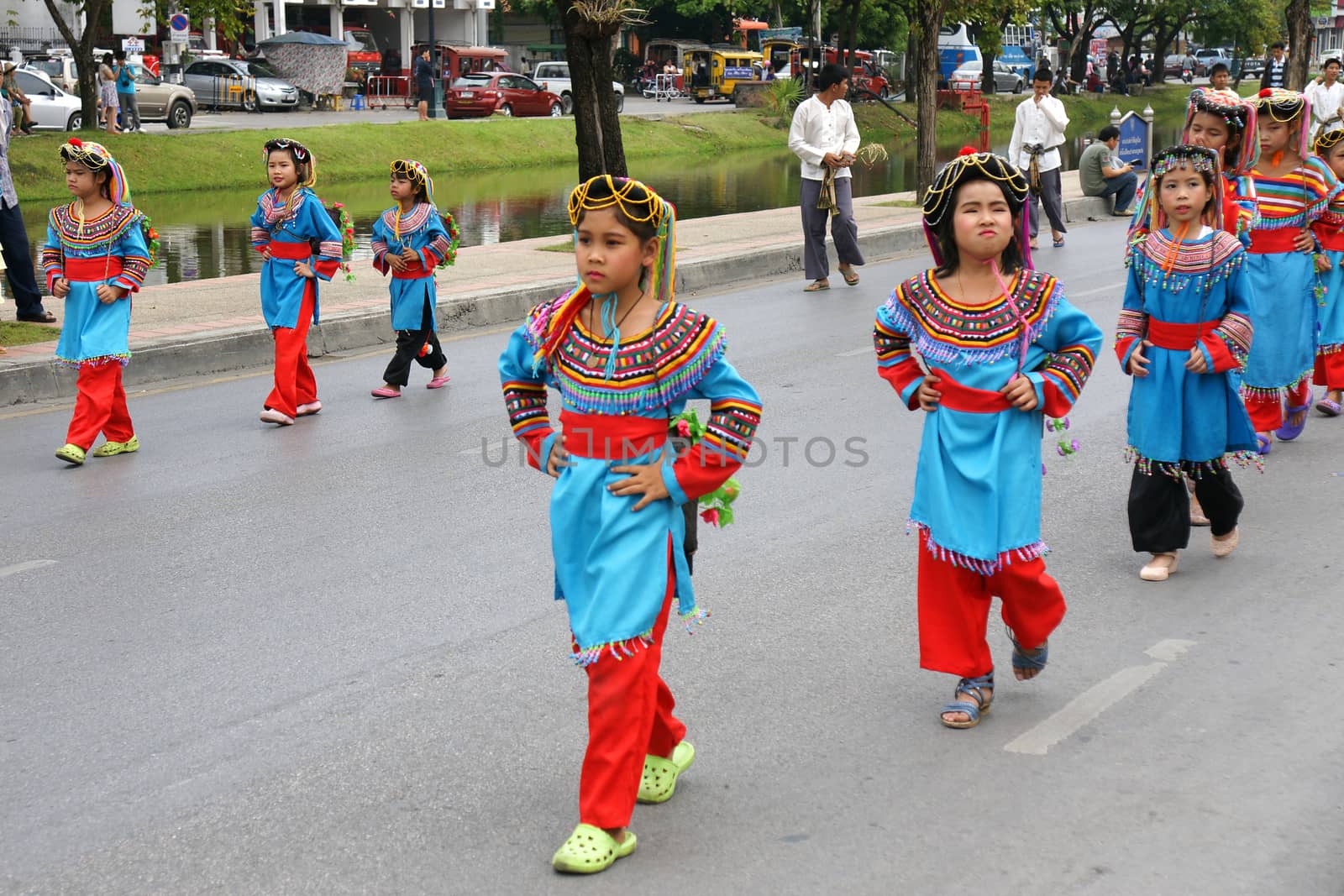 CHIANGMAI, THAILAND - FEBRUARY 2-2013 : Unidentified Thai people on the parade in ChiangMai Flower Festival 2013 at ChiangMai, Thailand.