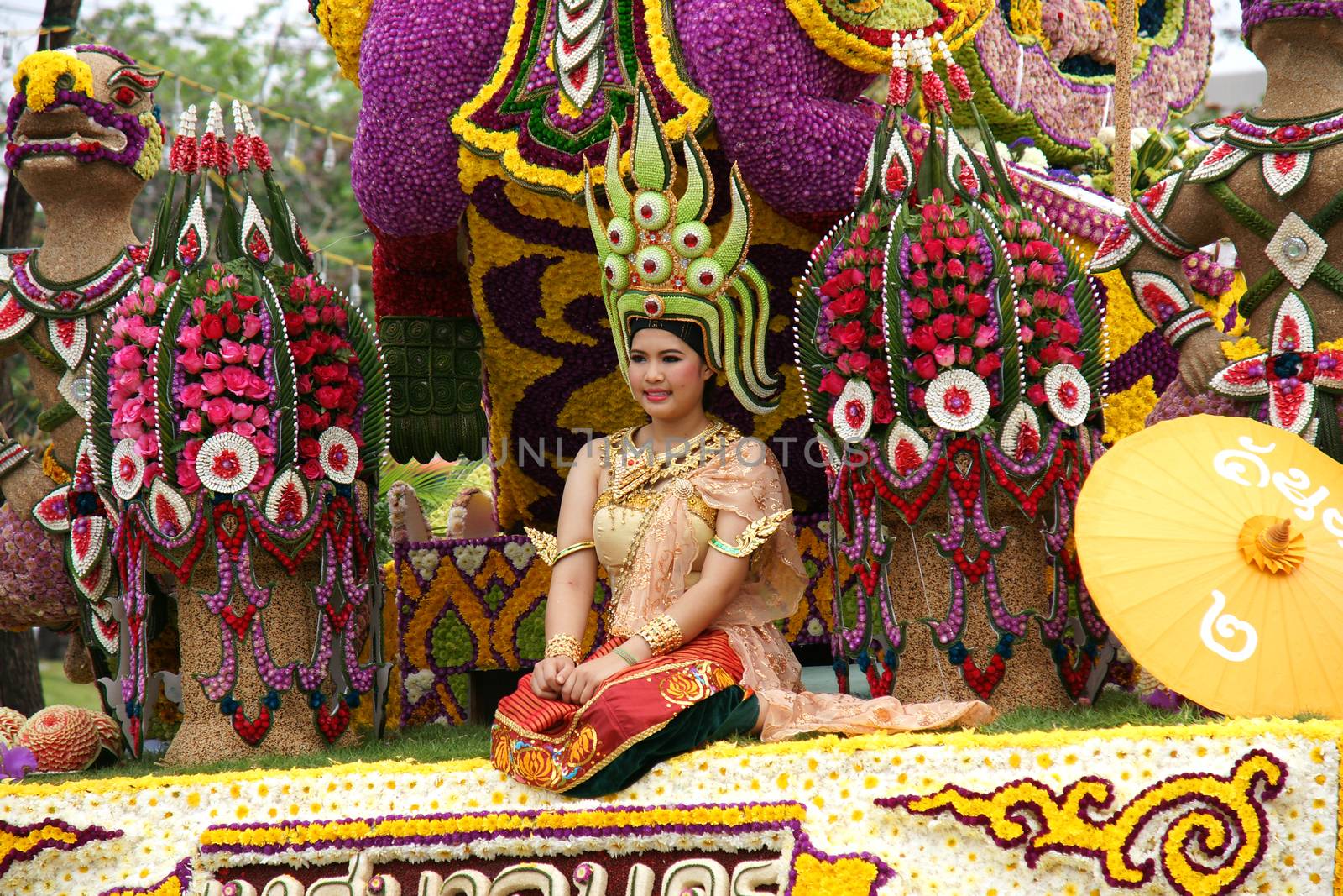 CHIANGMAI, THAILAND - FEBRUARY 2-2013 : Unidentified Thai people on the parade in ChiangMai Flower Festival 2013 at ChiangMai, Thailand.