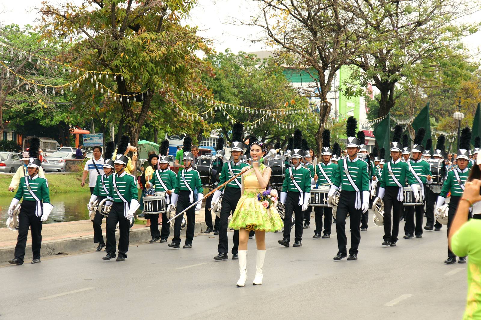 CHIANGMAI, THAILAND - FEBRUARY 2-2013 : Unidentified Thai people on the parade in ChiangMai Flower Festival 2013 at ChiangMai, Thailand.