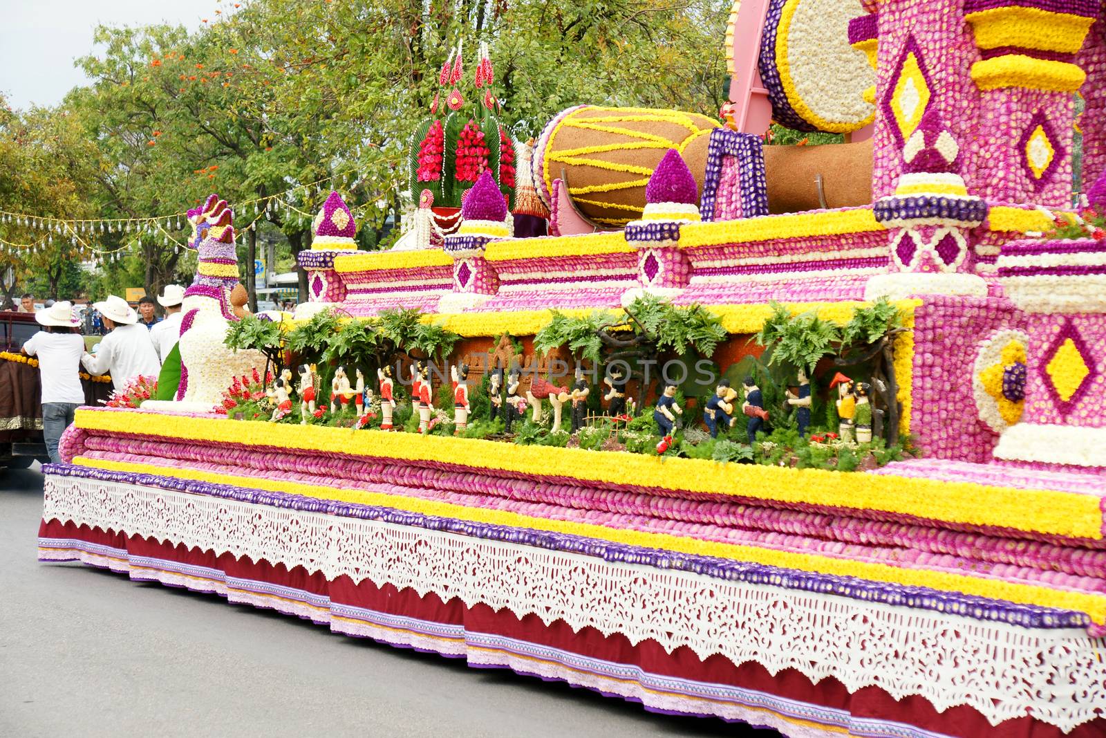 Thai people on the parade in ChiangMai Flower Festival 2013 by mranucha