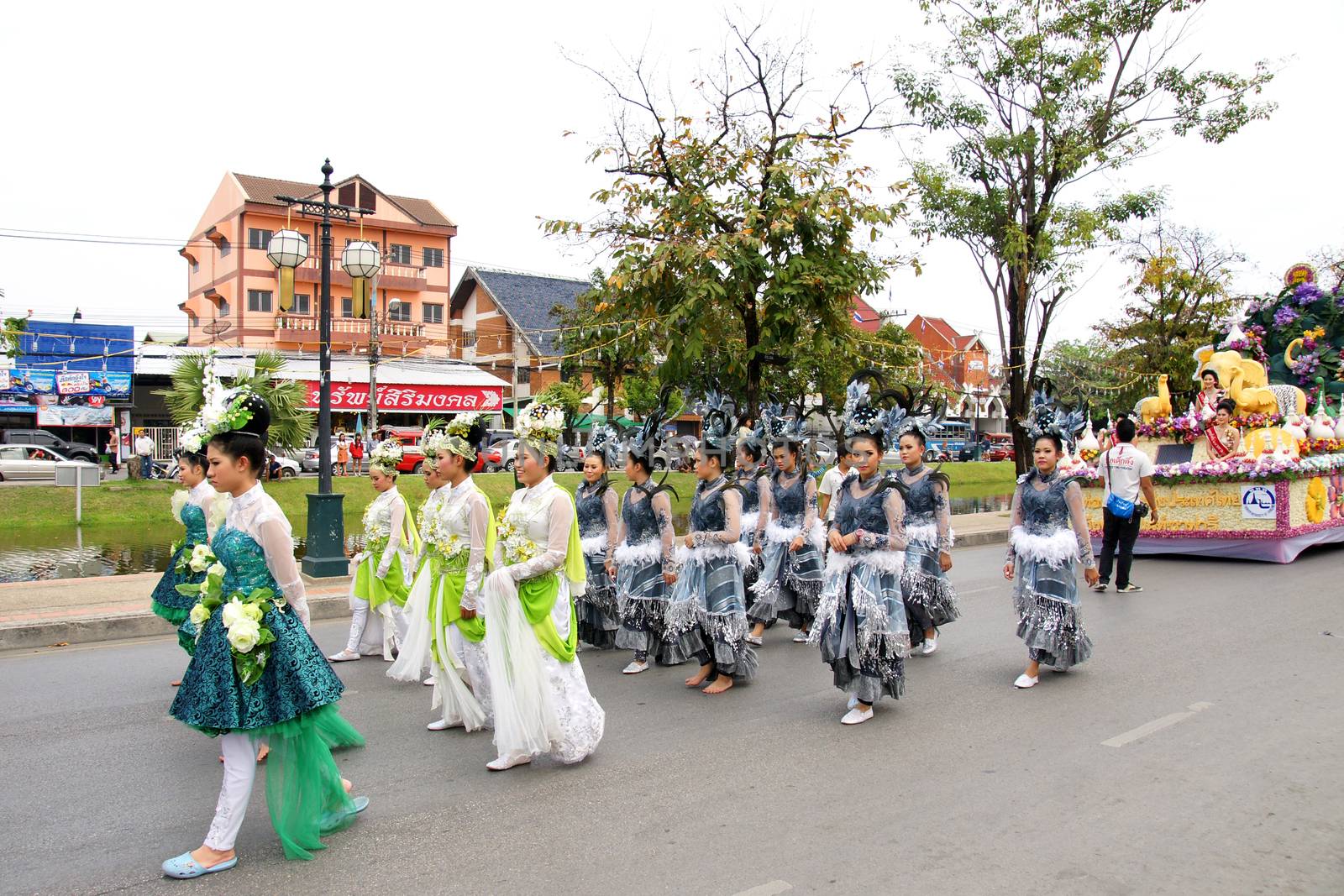 CHIANGMAI, THAILAND - FEBRUARY 2-2013 : Unidentified Thai people on the parade in ChiangMai Flower Festival 2013 at ChiangMai, Thailand.