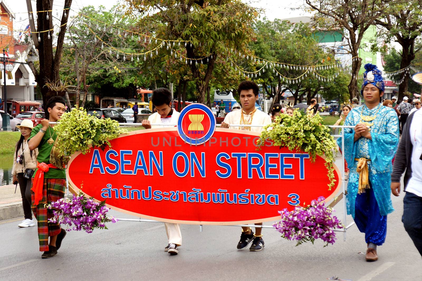 CHIANGMAI, THAILAND - FEBRUARY 2-2013 : Unidentified Thai people on the parade in ChiangMai Flower Festival 2013 at ChiangMai, Thailand.