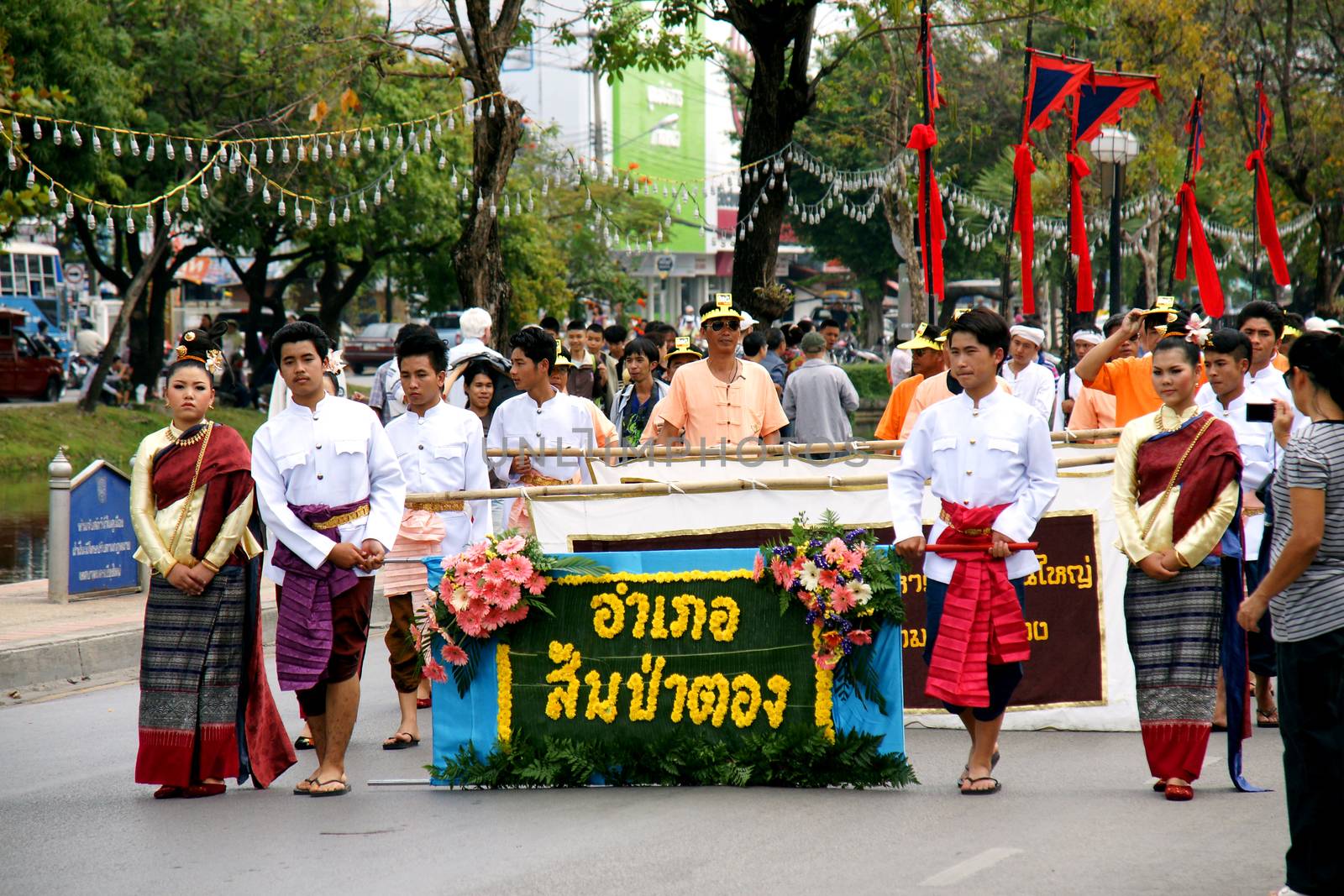 CHIANGMAI, THAILAND - FEBRUARY 2-2013 : Unidentified Thai people on the parade in ChiangMai Flower Festival 2013 at ChiangMai, Thailand.