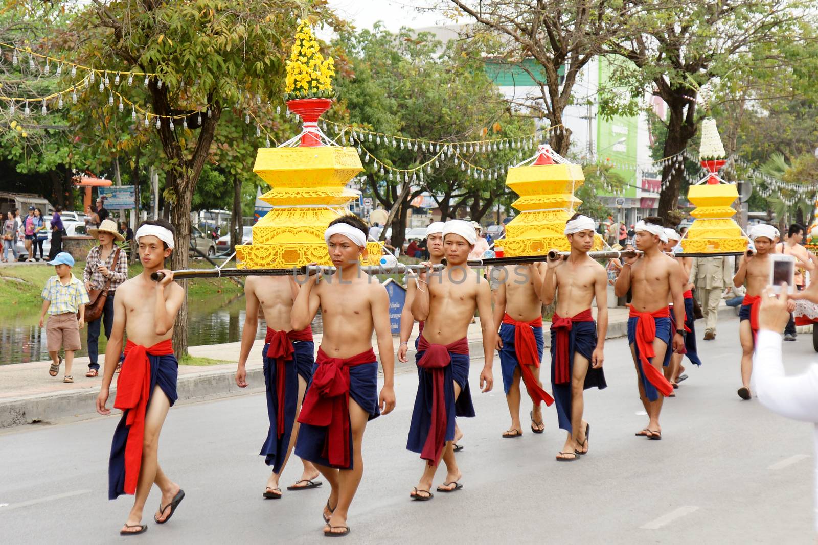 Thai people on the parade in ChiangMai Flower Festival 2013 by mranucha