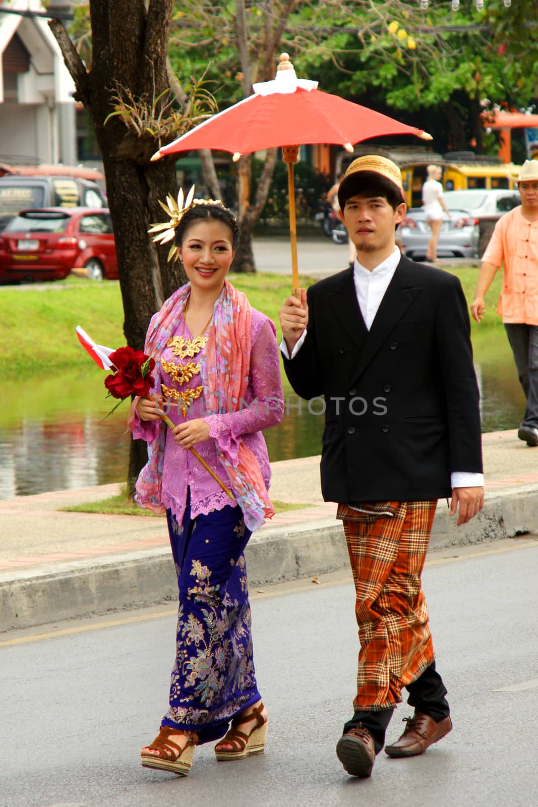 CHIANGMAI, THAILAND - FEBRUARY 2-2013 : Unidentified Thai people on the parade in ChiangMai Flower Festival 2013 at ChiangMai, Thailand.