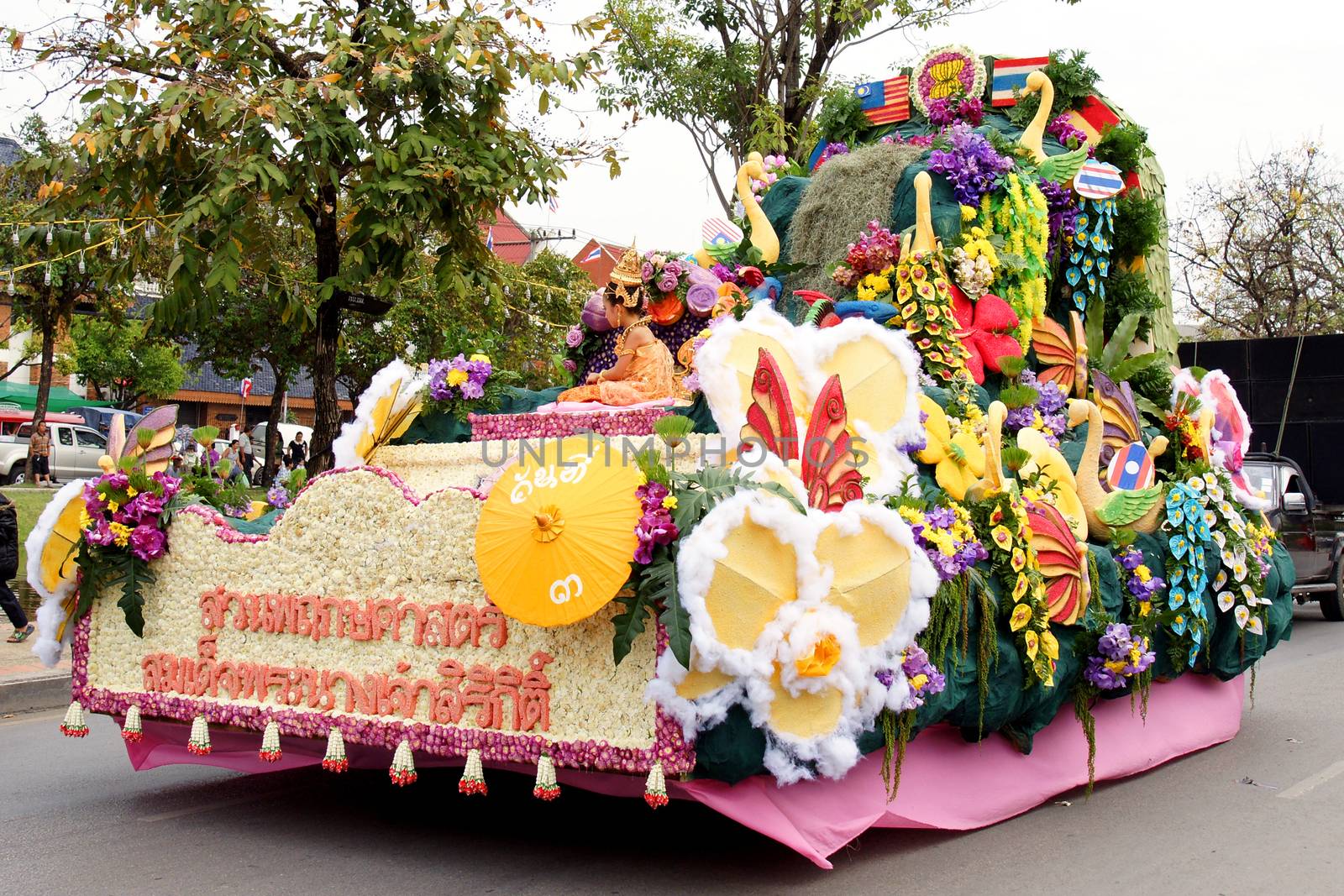 CHIANGMAI, THAILAND - FEBRUARY 2-2013 : Unidentified Thai people on the parade in ChiangMai Flower Festival 2013 at ChiangMai, Thailand.