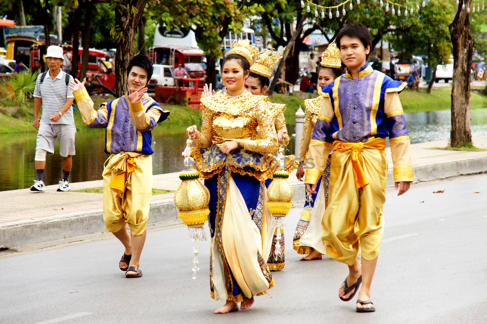 Thai people on the parade in ChiangMai Flower Festival 2013 by mranucha