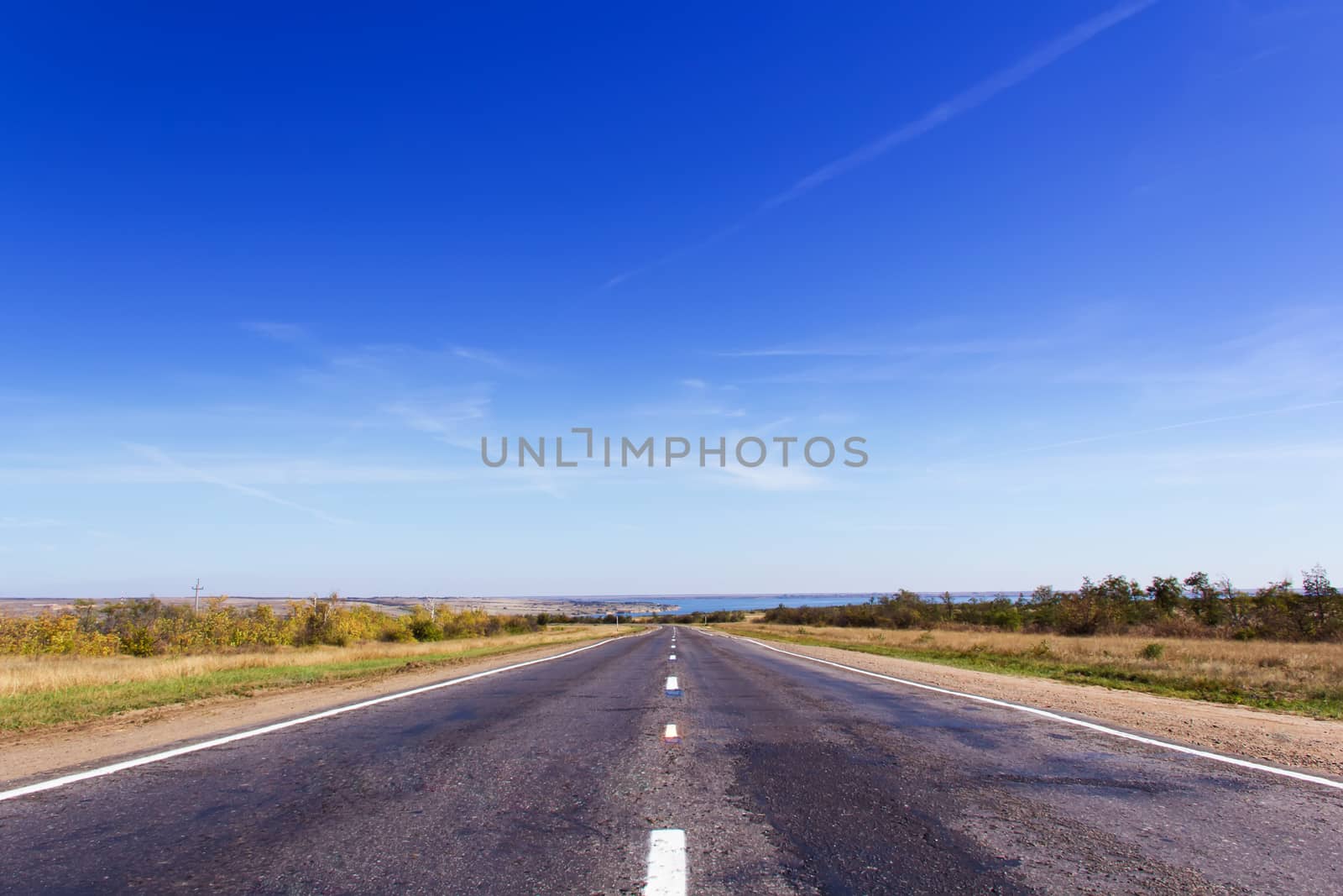 Photo of day landscape with road perspective