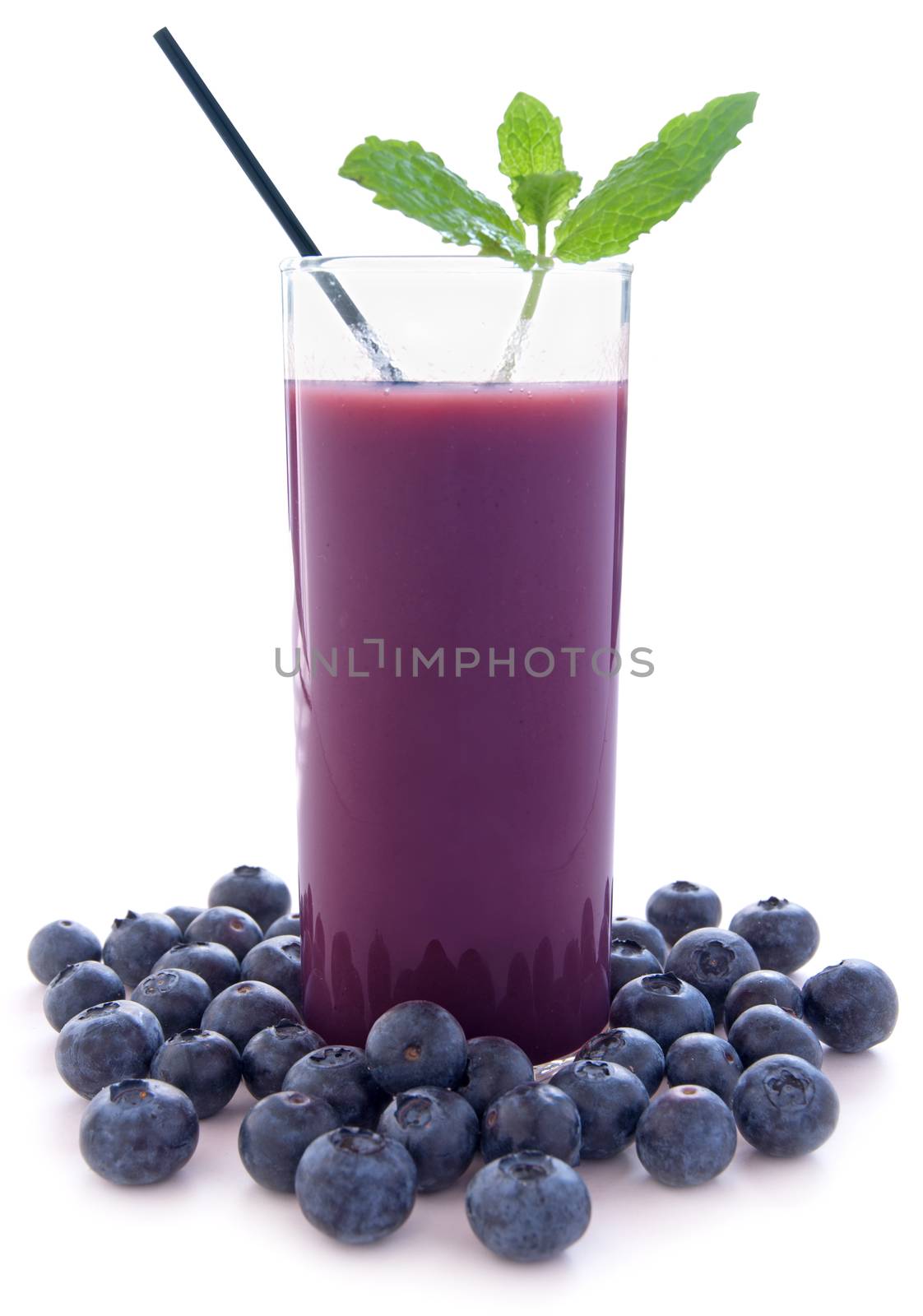 Blueberry smoothie over a white background