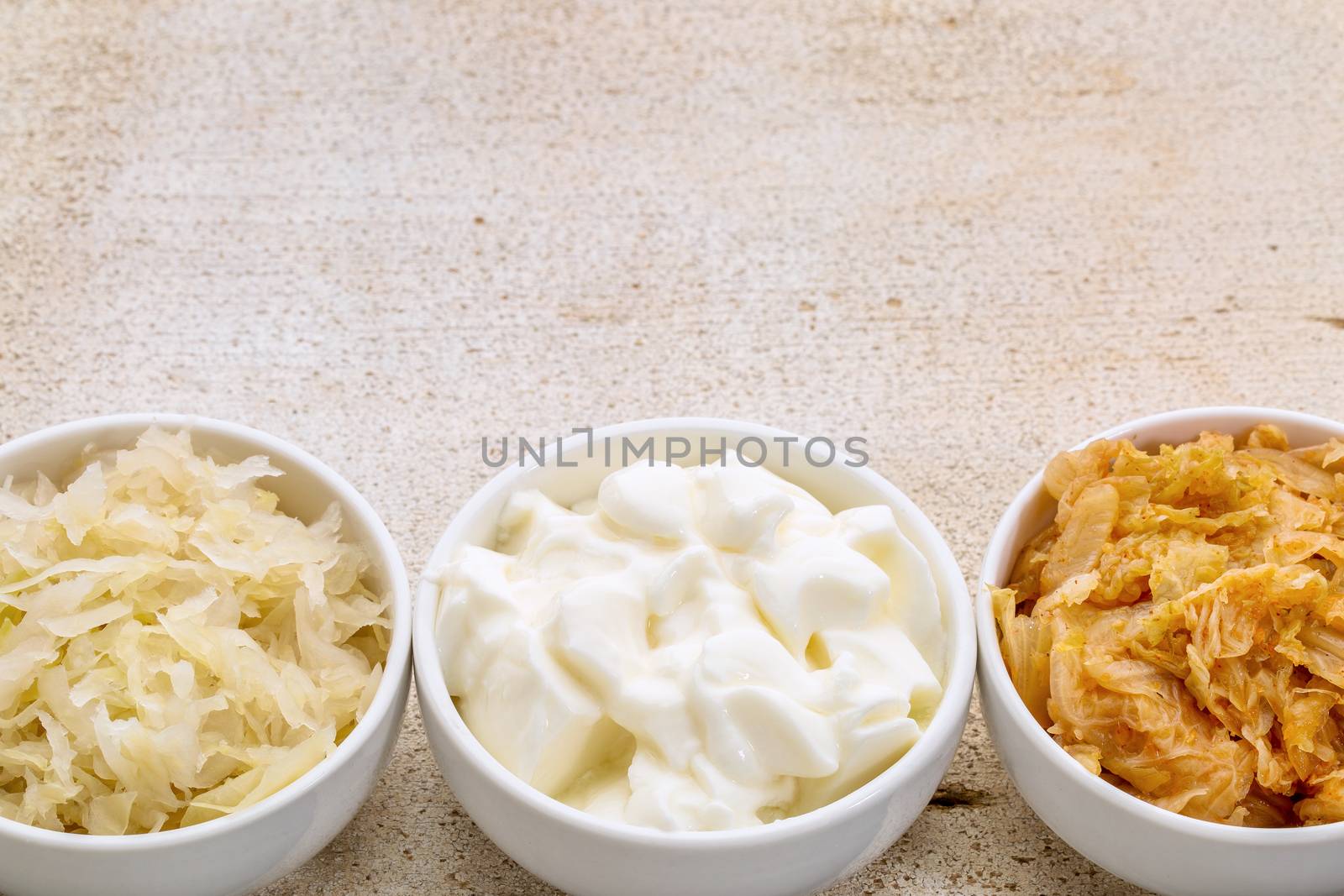 sauerkraut, kimchi and yogurt by PixelsAway