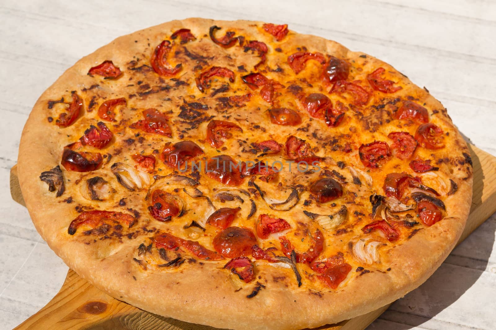 Focaccia with tomatoes and onion