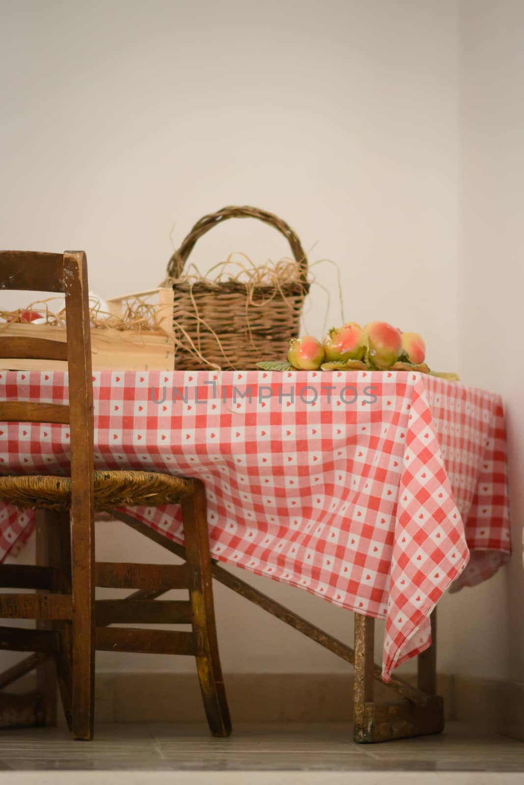 table with tablecloth and chair