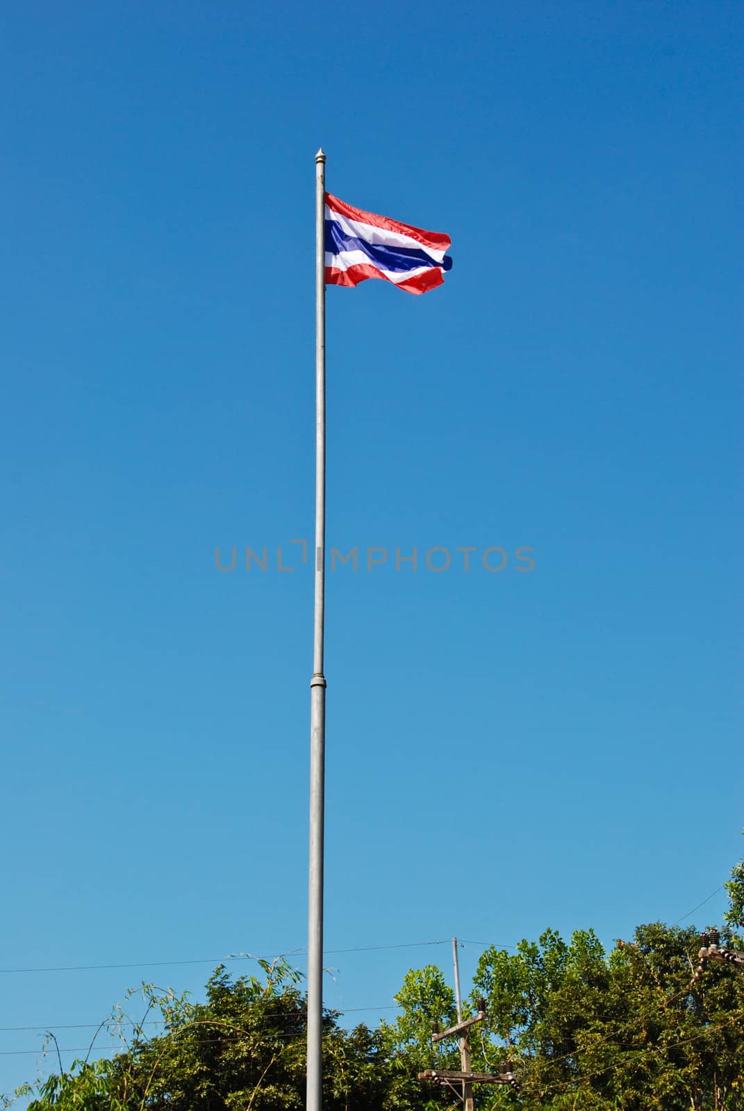 the thai flag stand in front of school thailand
