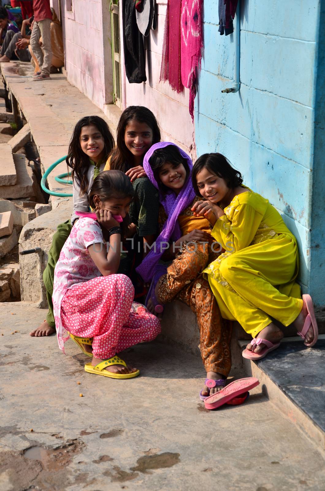 Jodhpur, India - January 2, 2015: Portrait of Indian children in village in Jodhpur by siraanamwong