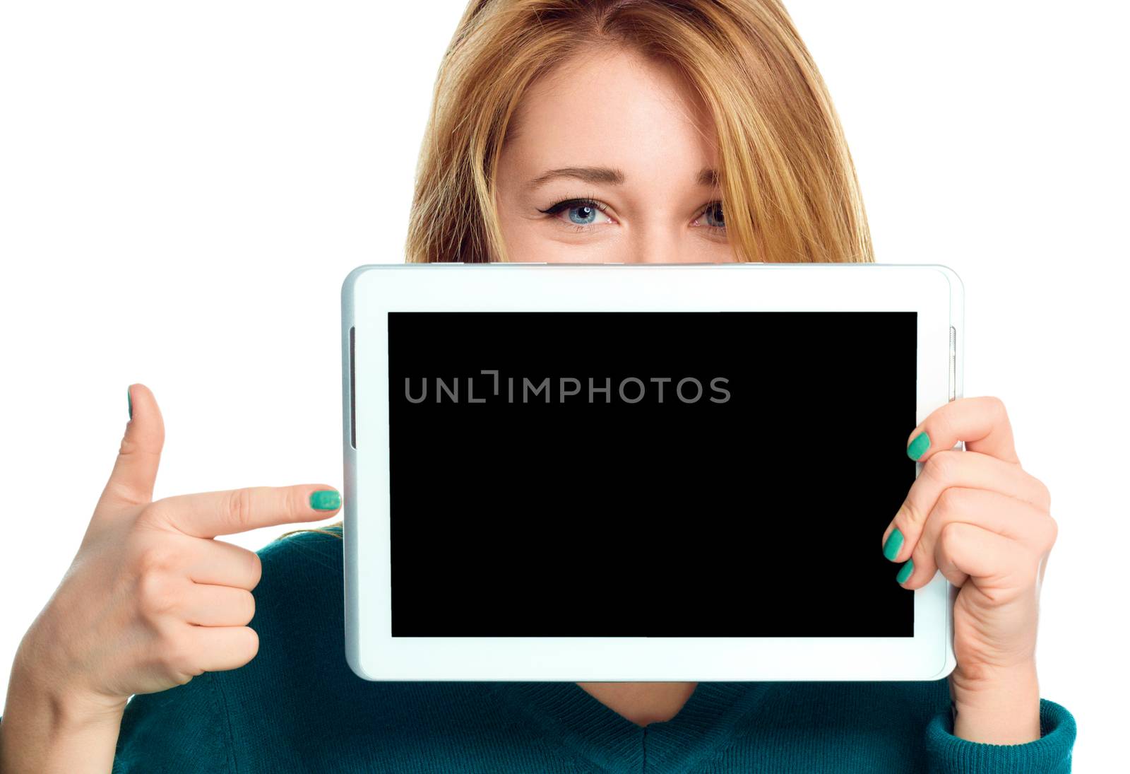 Young cheerful woman is showing blank tablet, isolated over white