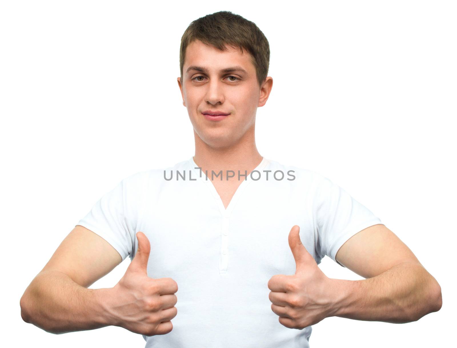 Happy smiling guy showing thumb up hand sign isolated on white background