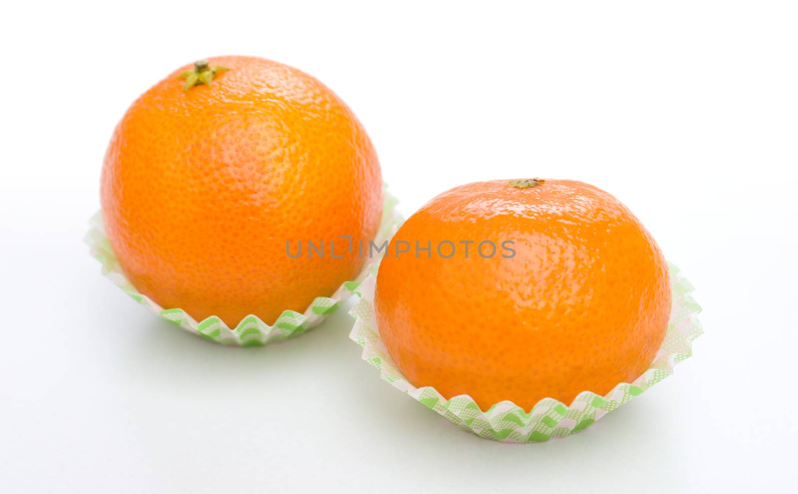 Orange mandarin or tangerine fruit isolated on white background