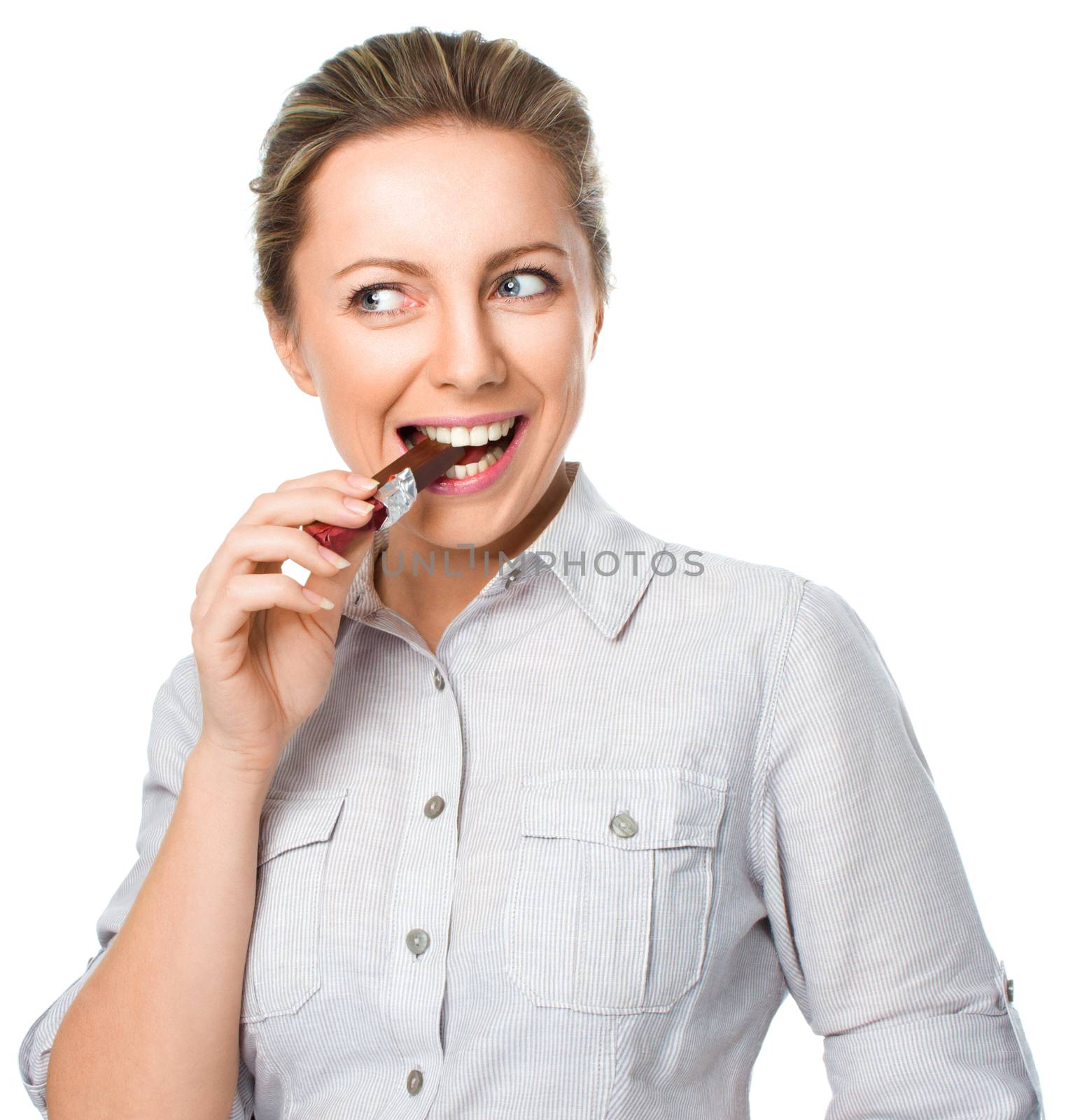 portrait of a young woman biting chocolate isolated on white by id7100