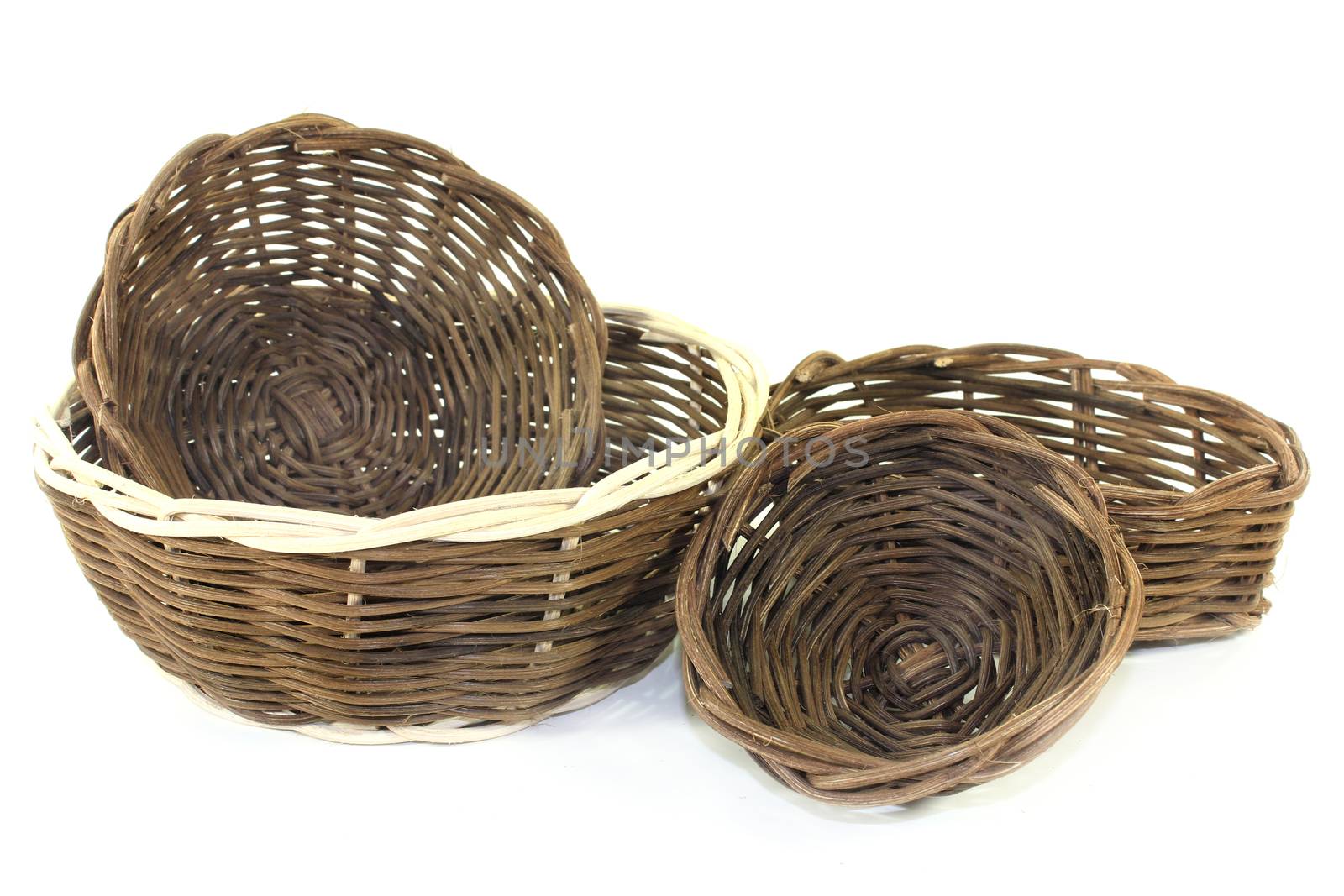 braided wicker baskets against a bright background