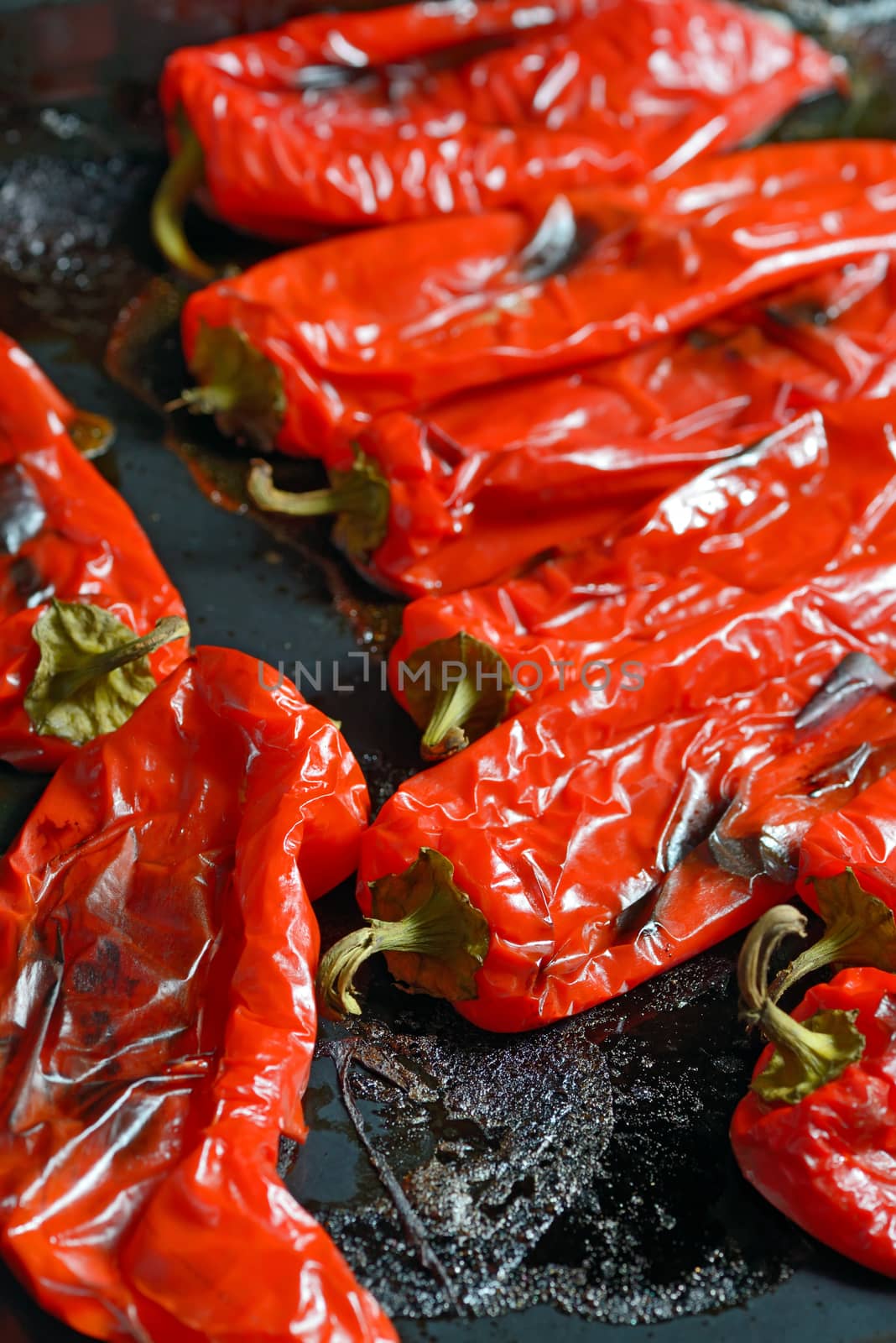 roasted red peppers on steel tray