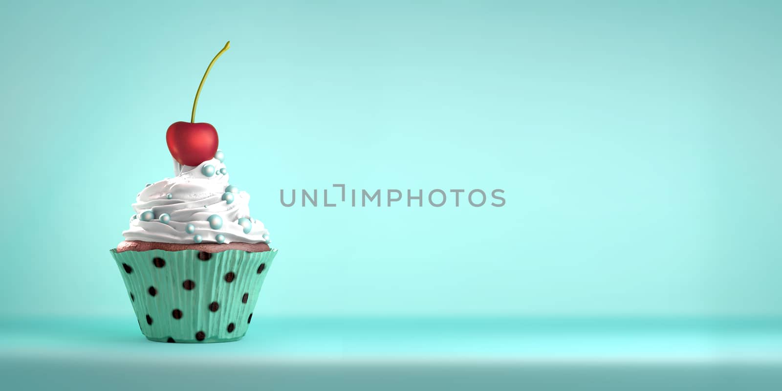 Delicious cupcake topped with a cherry with whipped cream and sweeties. The cherry on the cake metaphor. Copy space.