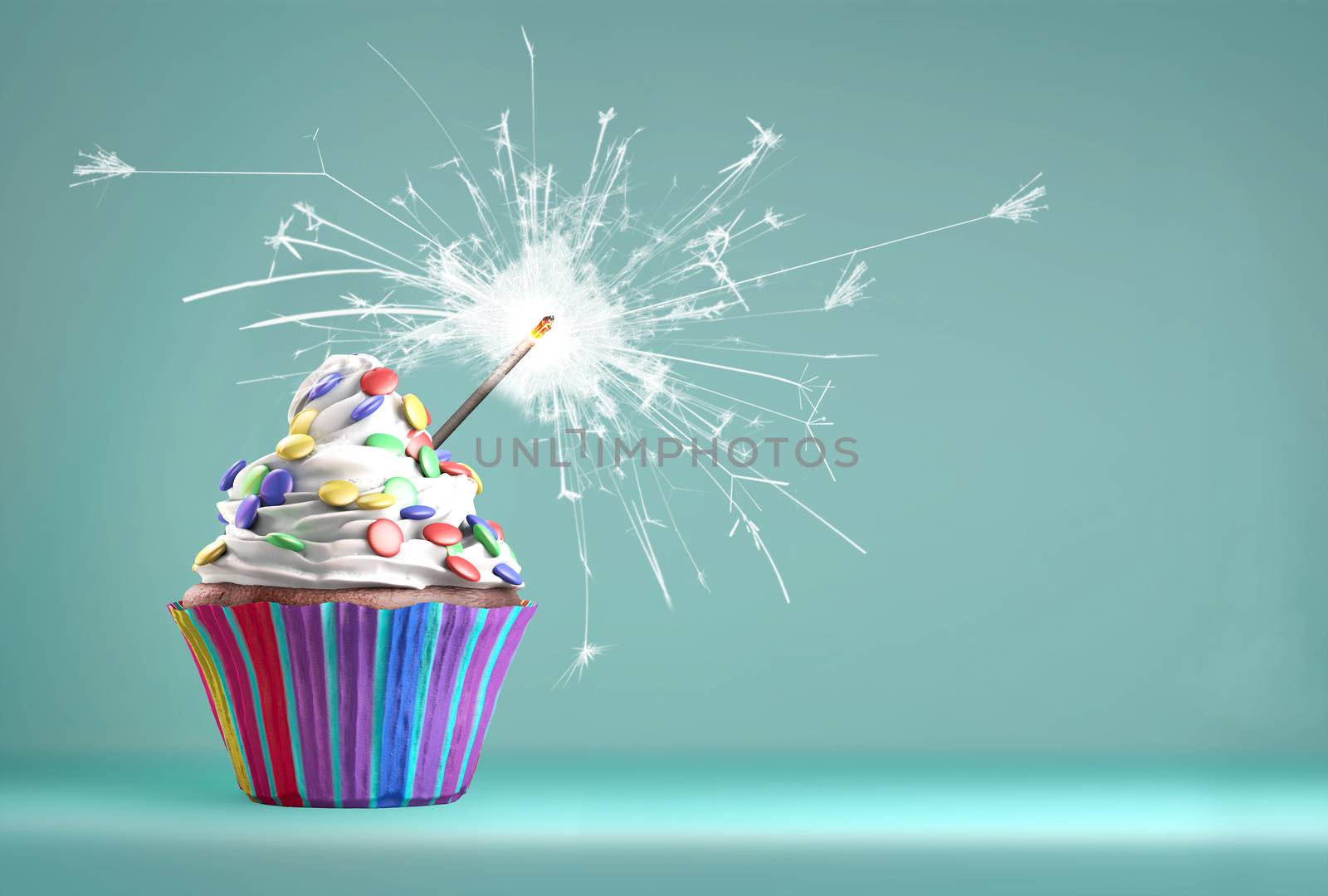 Delicious cupcake with a glittering sparkler and smarties on a whipped cream. Colored disks background. Copy space available.