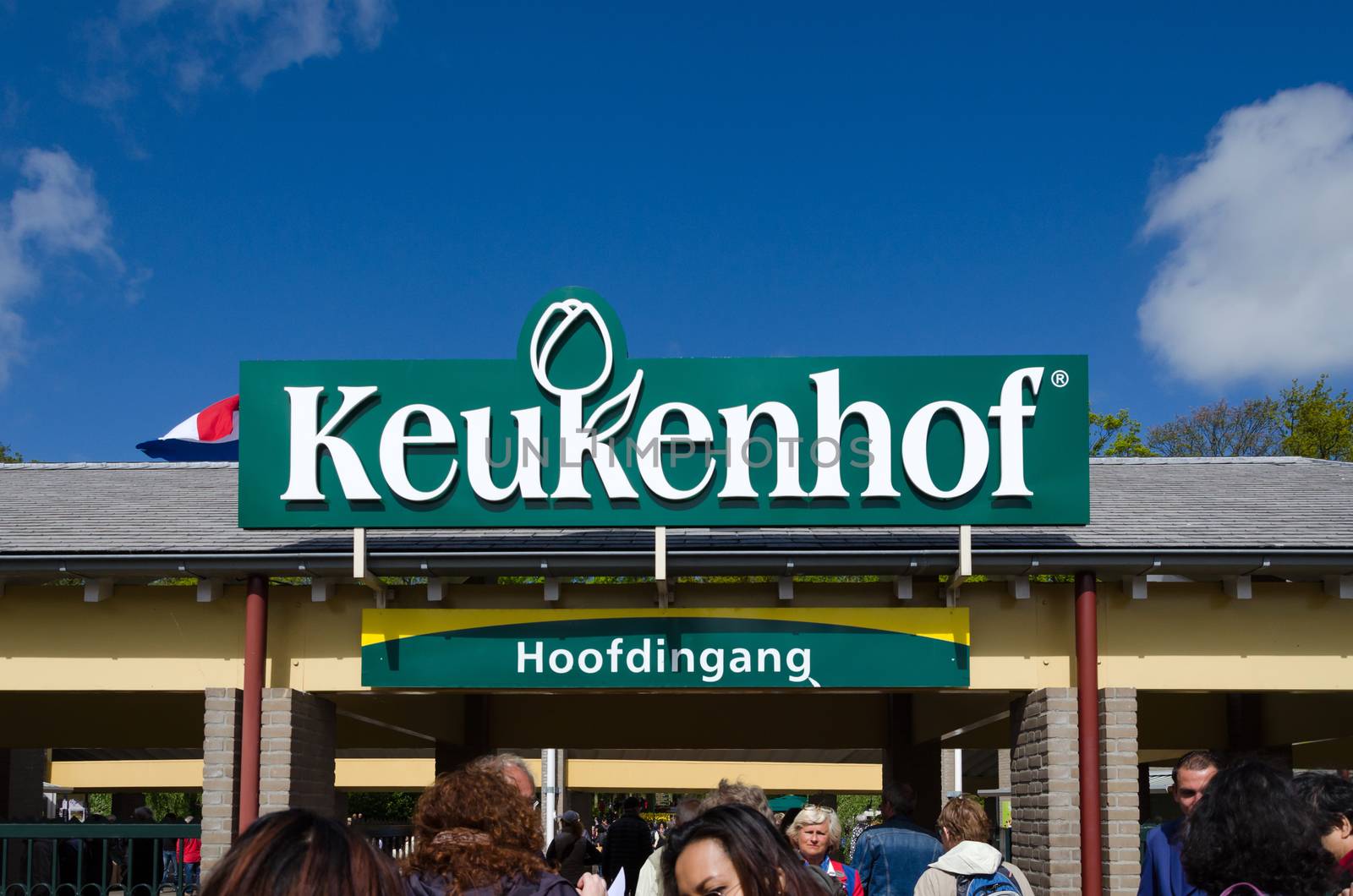 Lisse, Netherlands - May 7, 2015: Tourists at the Entrance into the Keukenhof Garden on May 7, 2015. Keukenhof is the most beautiful spring garden in the world.