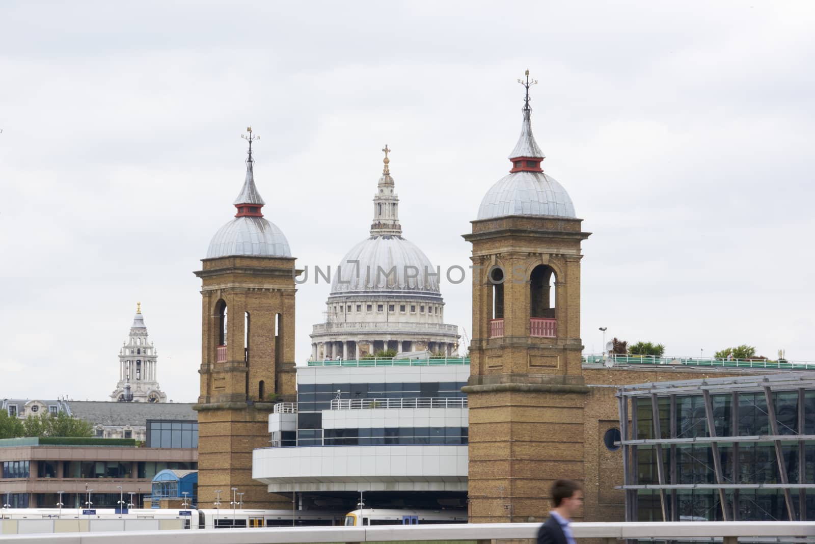 LONDON, UK - JUNE 23: Dome of Saint Paul's cathedral framed by bridge towers, seen from Blackfriars. June 23, 2015 in London.