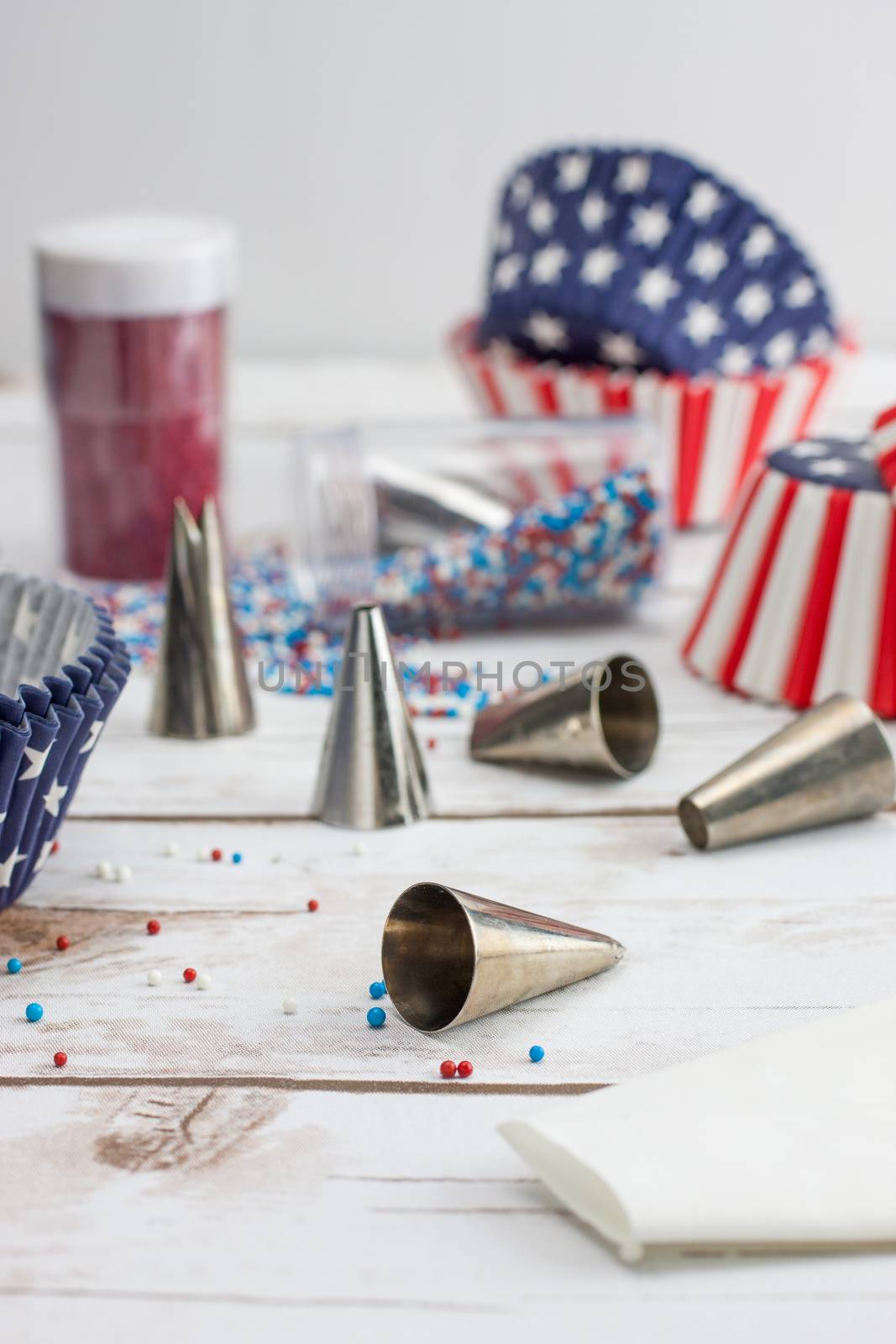 Table filled with baking and decorating tools in preperation for 4th of July baking.