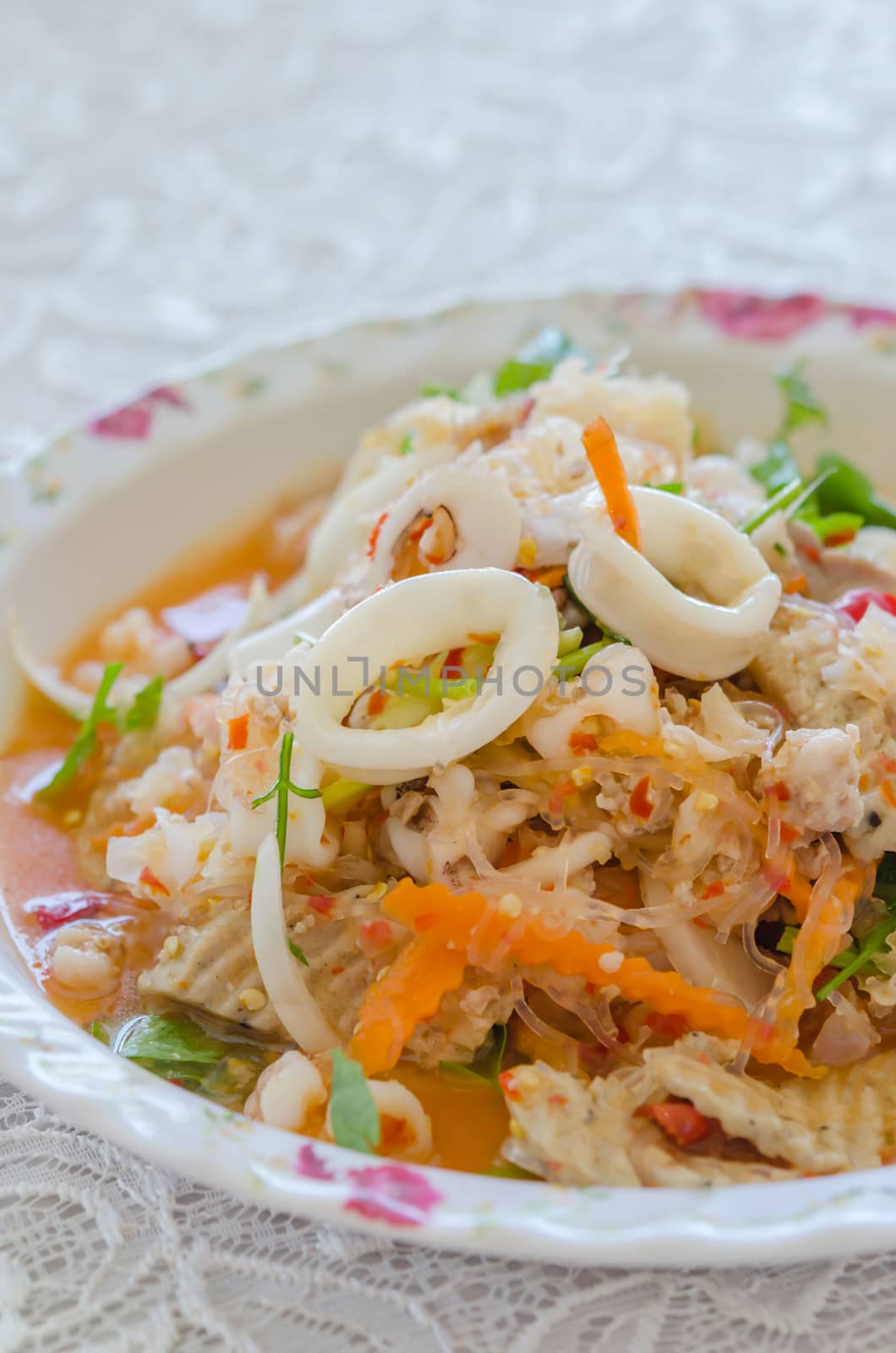 close up spicy mix salad with seafood  and  fresh vegetable