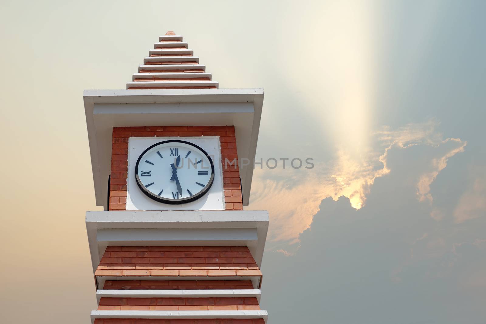 clock tower with beautiful sunbeam background