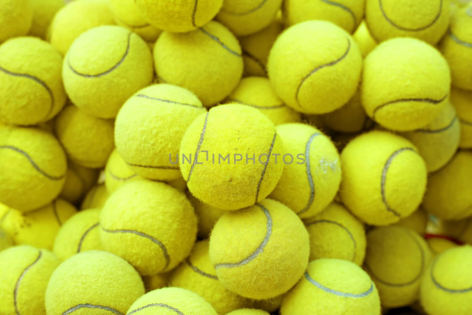 exotic yellow tennis ball as sport background