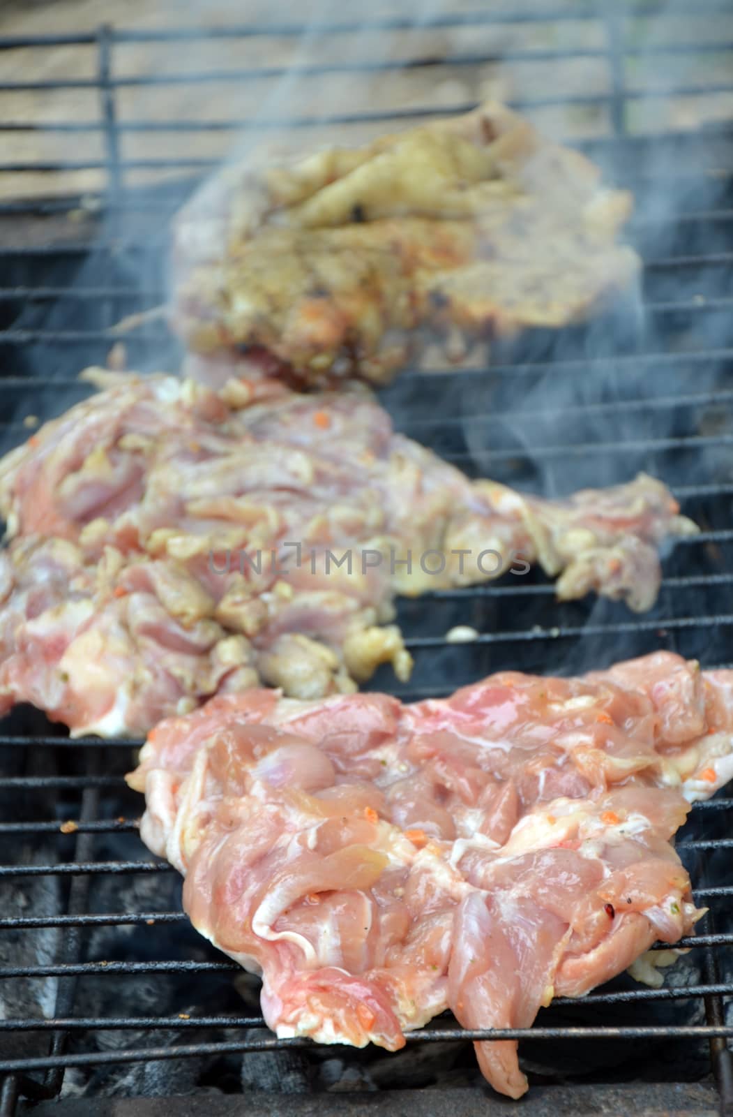 Picture of a Chicken on a grill. Food concept