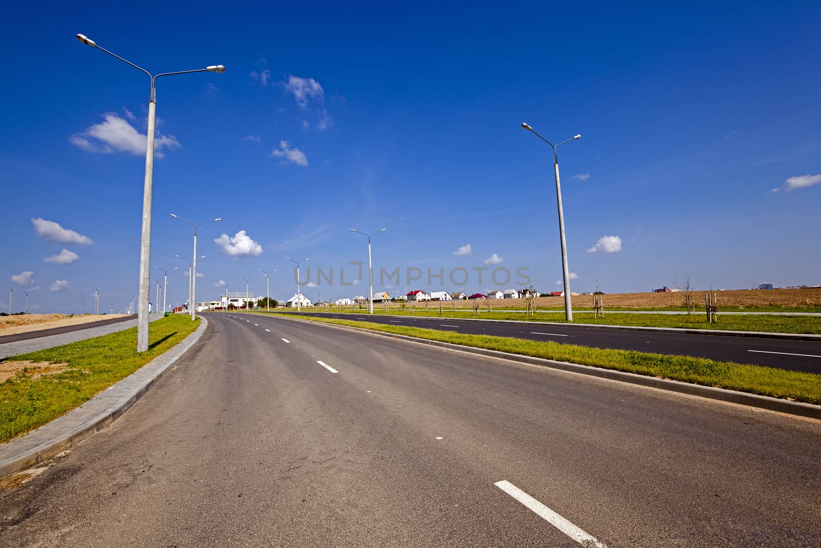   the constructed new road in the new district of the city under construction