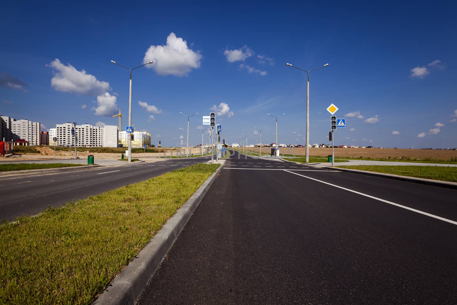   the constructed new road in the new district of the city under construction