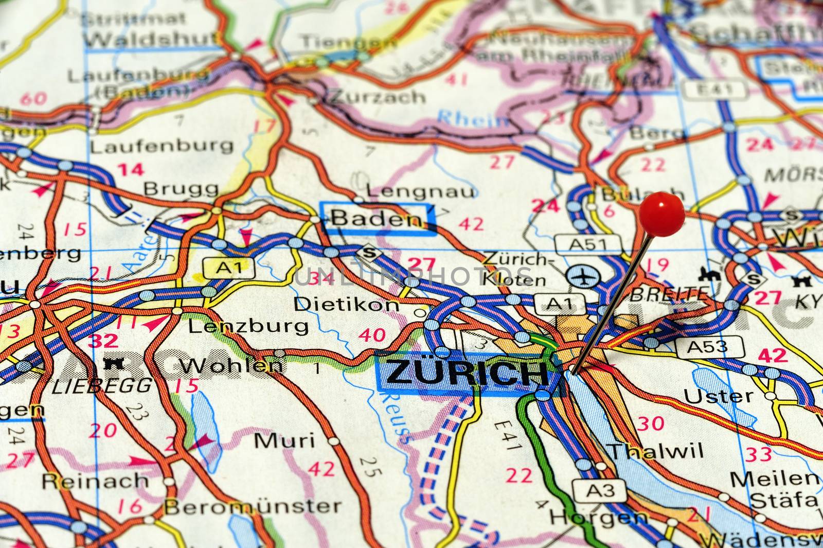 A red pushpin on a map pointing to Zurich, Switzerland.