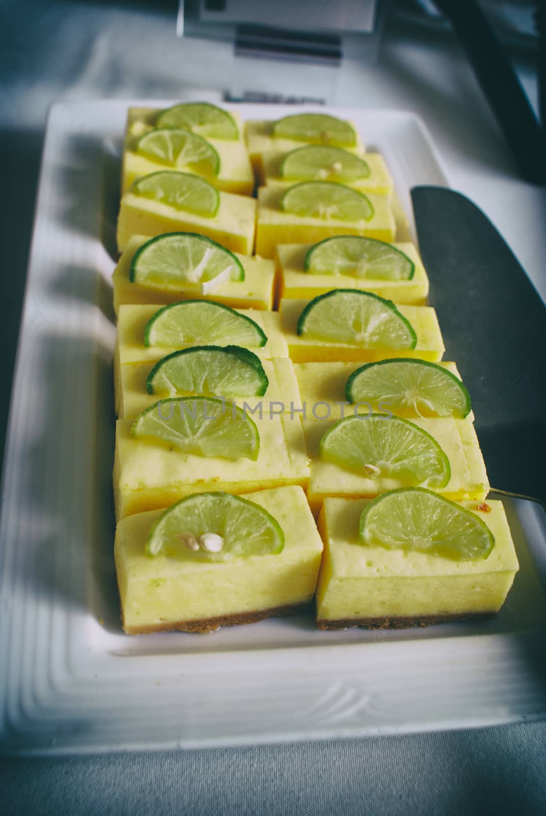 Photograph of a plate with a lemon pie dessert