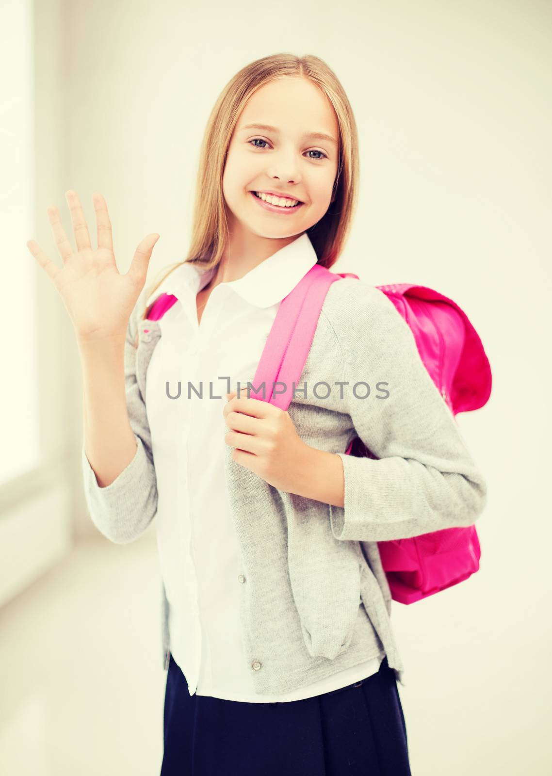 education and school concept - happy and smiling teenage girl with school bag