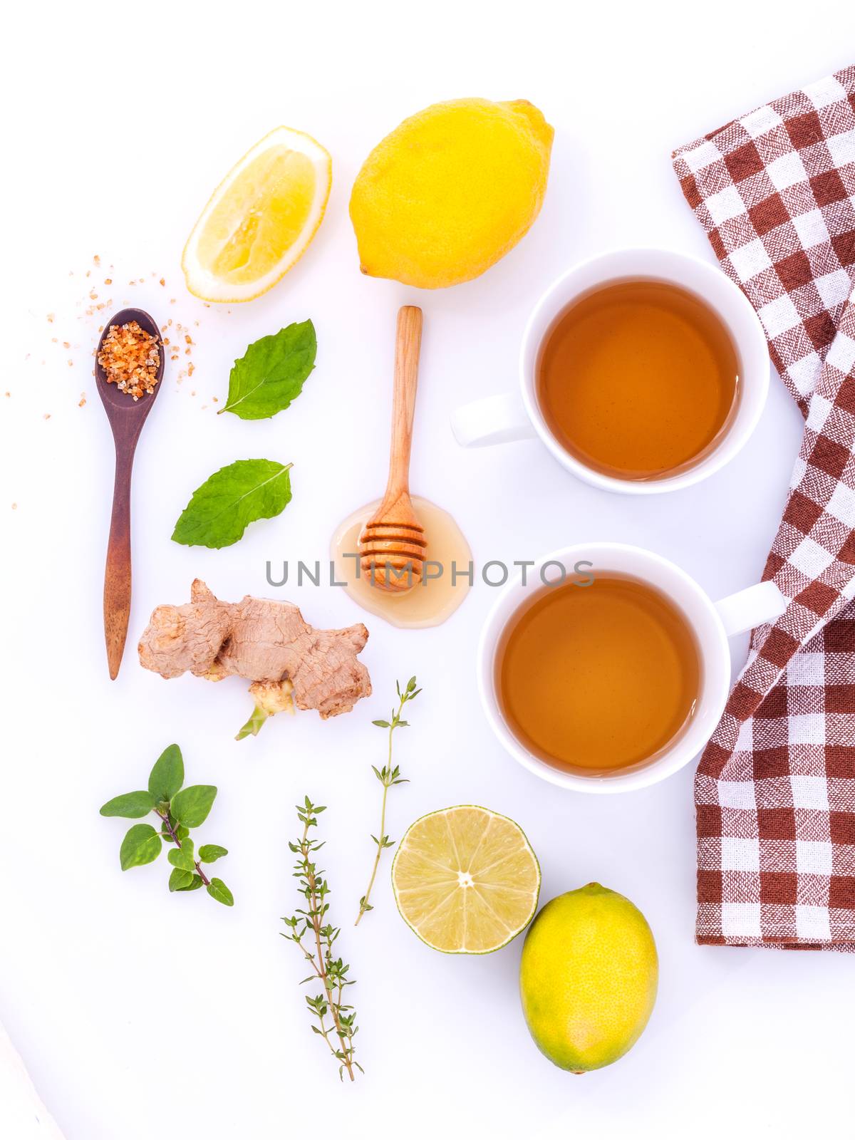 Cups of herbal  tea with aromatic herbal with lemon , lime and h by kerdkanno