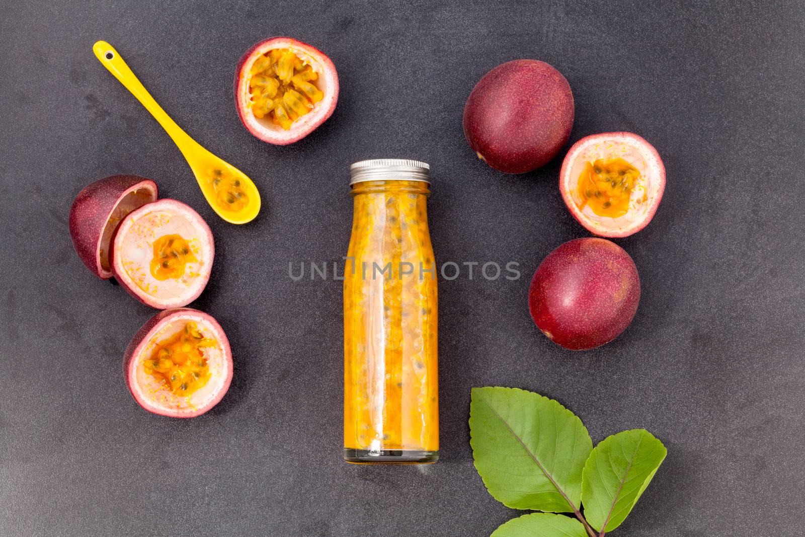 Fresh passion fruit and juice in the bottle for healthy and refresh.