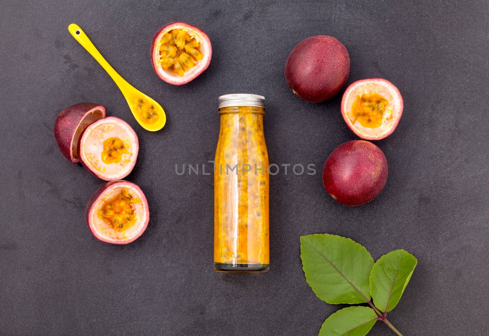 Fresh passion fruit and juice in the bottle for healthy and refr by kerdkanno