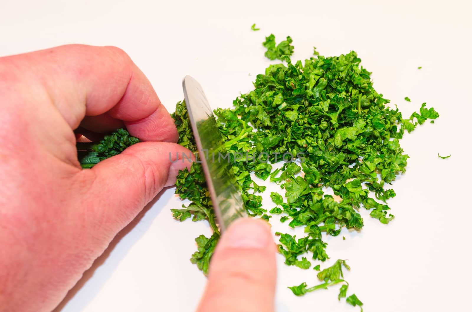 Chopping parsley by JFsPic