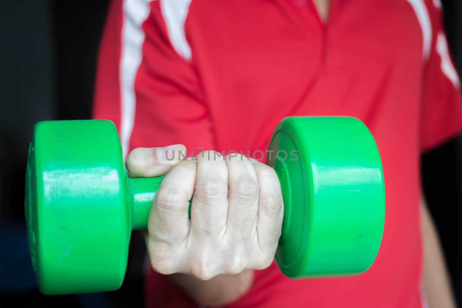 Fitness Man Lifting Weights - Green Dumbell