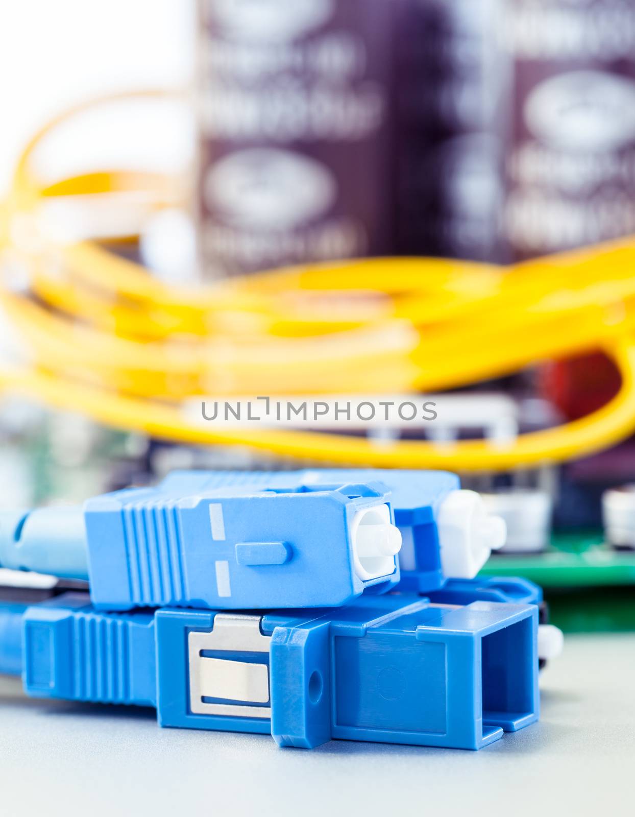 Closeup of fiber optic connector with Circuits board