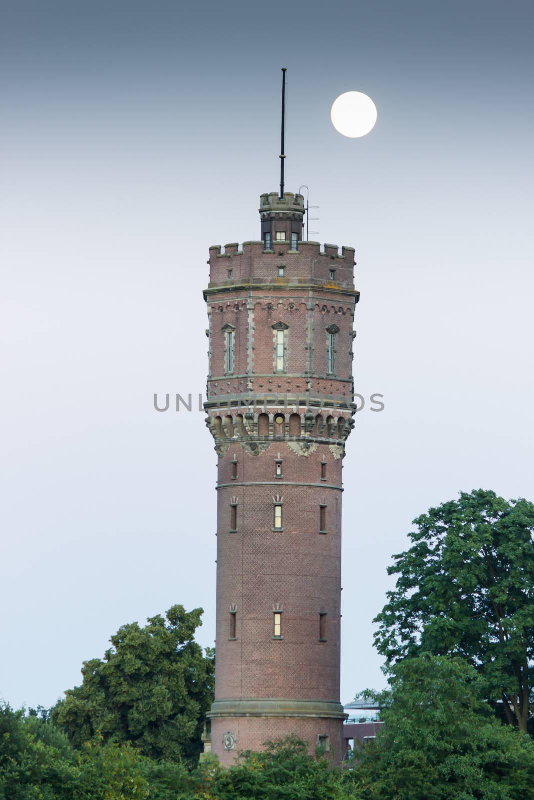 Watertower with full moon by BenSchonewille