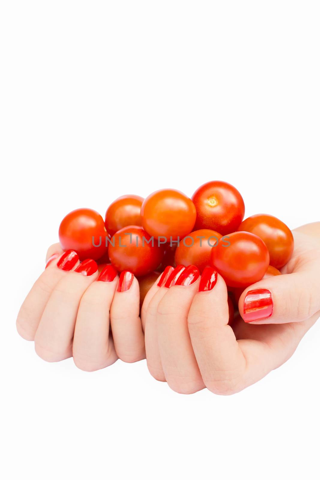 Two hands holding cherry tomatoes by BenSchonewille